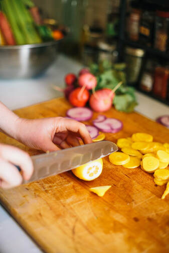 Hand chopping nutrient dense meyer lemon