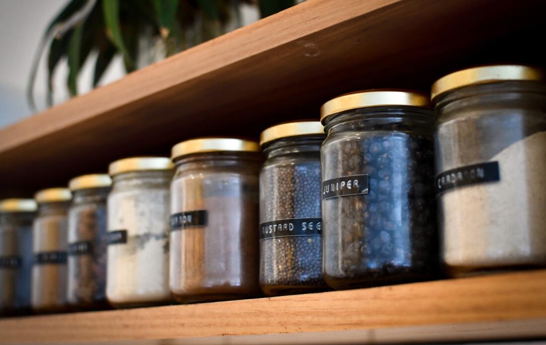 Pantry full of jar with labels 